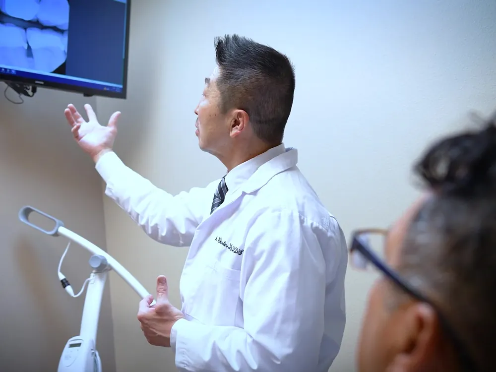 Dr. Lee explains X-rays on the screen