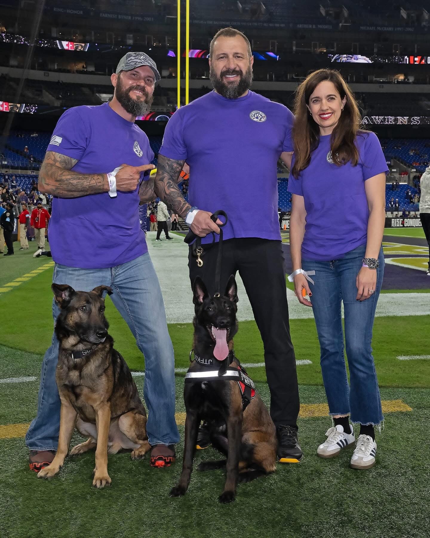JTF K9s teams on the field at an NFL game